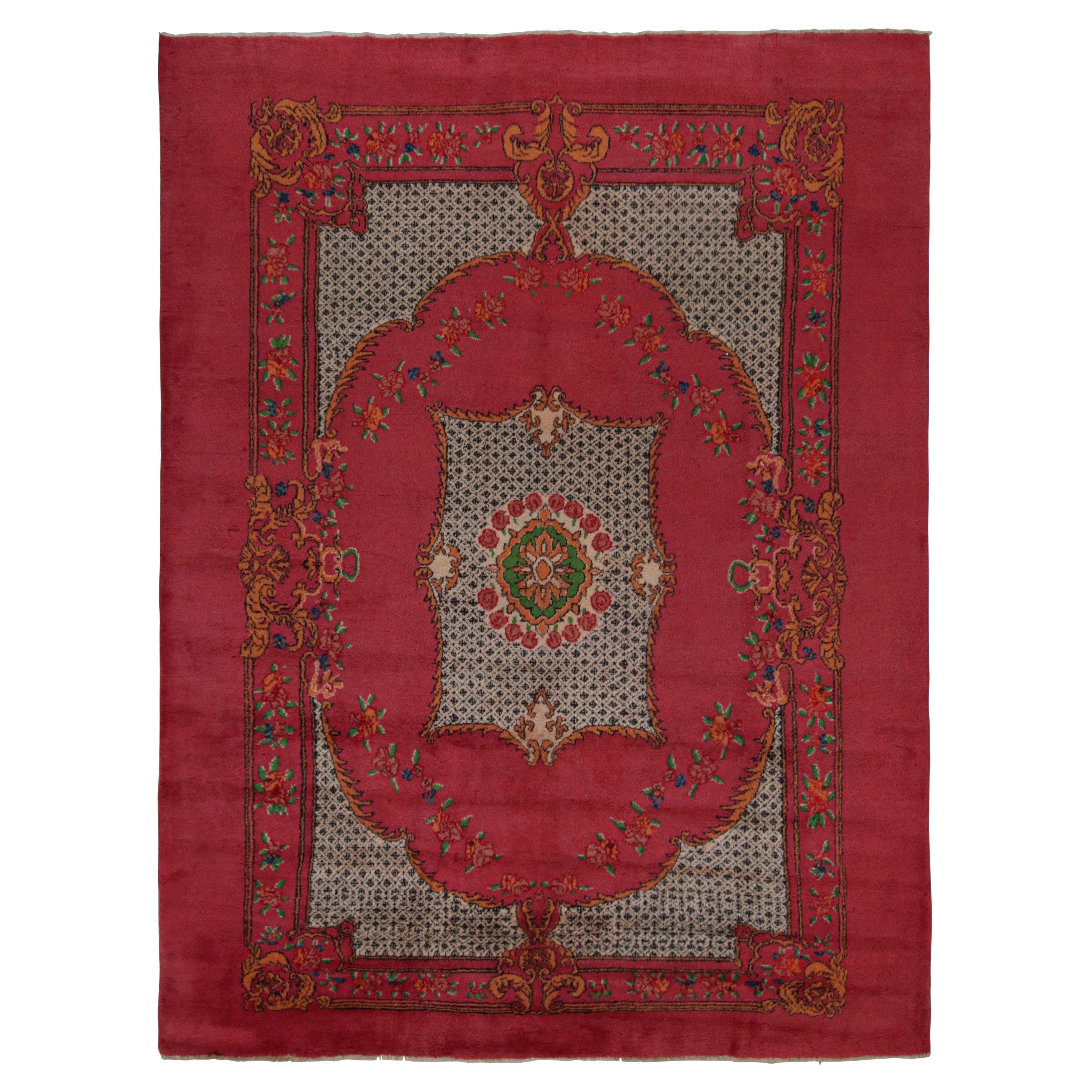 Rare tapis Isparta rose avec motifs floraux