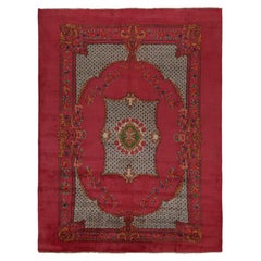 Rare tapis Isparta rose avec motifs floraux