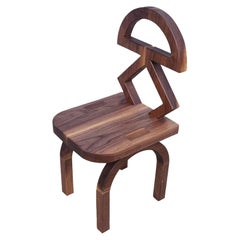 Studio Apotroes Annie Stuhl Nr.1, Moderner afrikanischer Stuhl aus Massivholz 