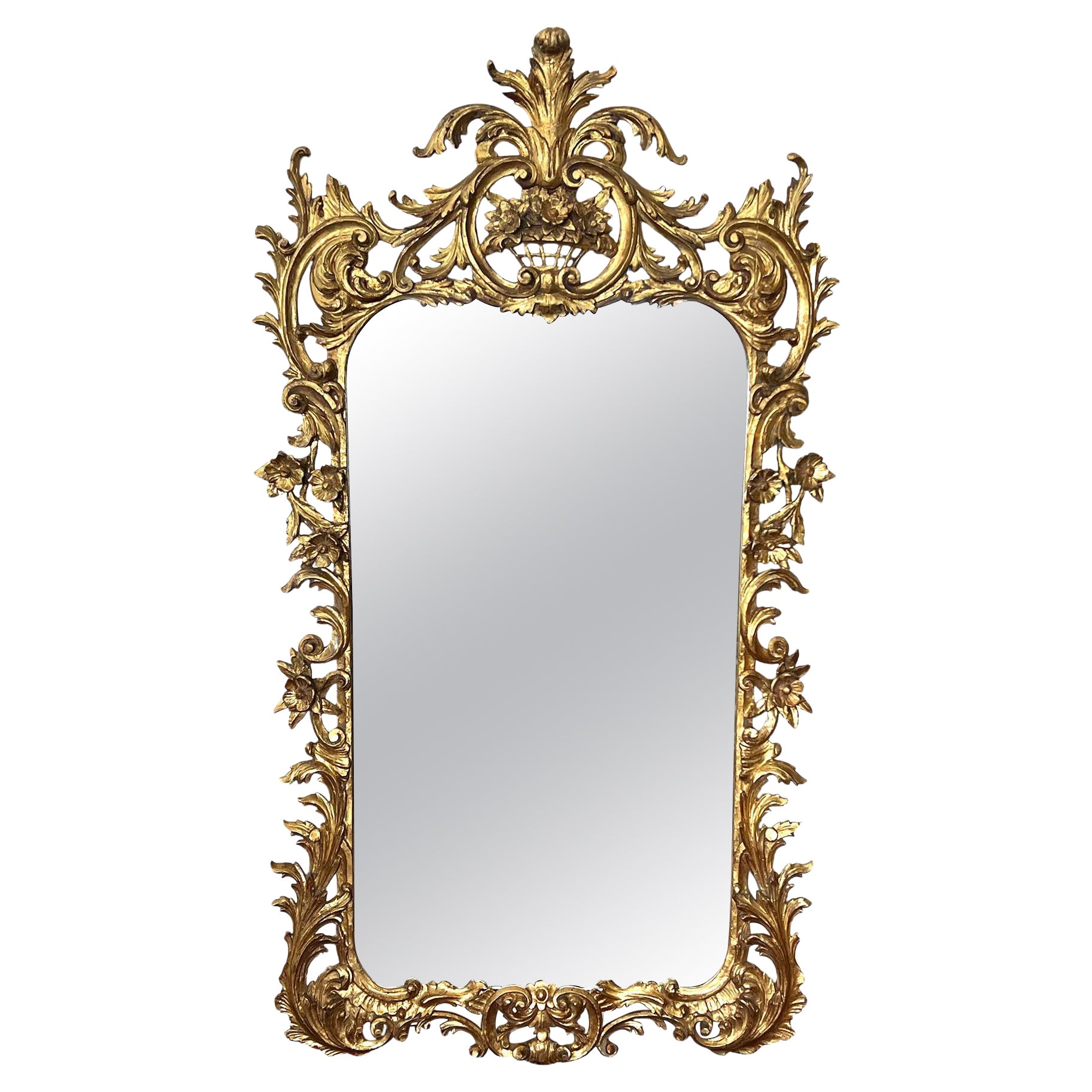 A Well-Carved French Rococo Style Giltwood Wall Mirror with Exuberant Crest For Sale