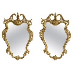 Paire de miroirs en bronze d'ore de style Louis XV du début du 20e siècle