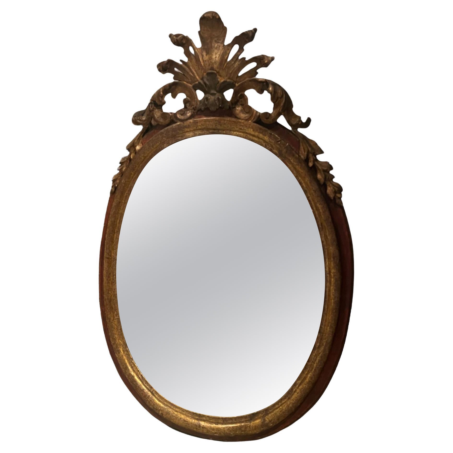 Mirror of oval shape 18th century  For Sale