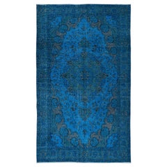 Vintage 5.3x9 Ft Modern Blue Area Rug made of wool and cotton, Hand-Knotted in Turkey