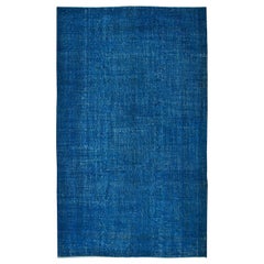 Vintage 5.3x8.8 Ft Handmade Turkish Wool Area Rug in Solid Blue 4 Modern Interiors