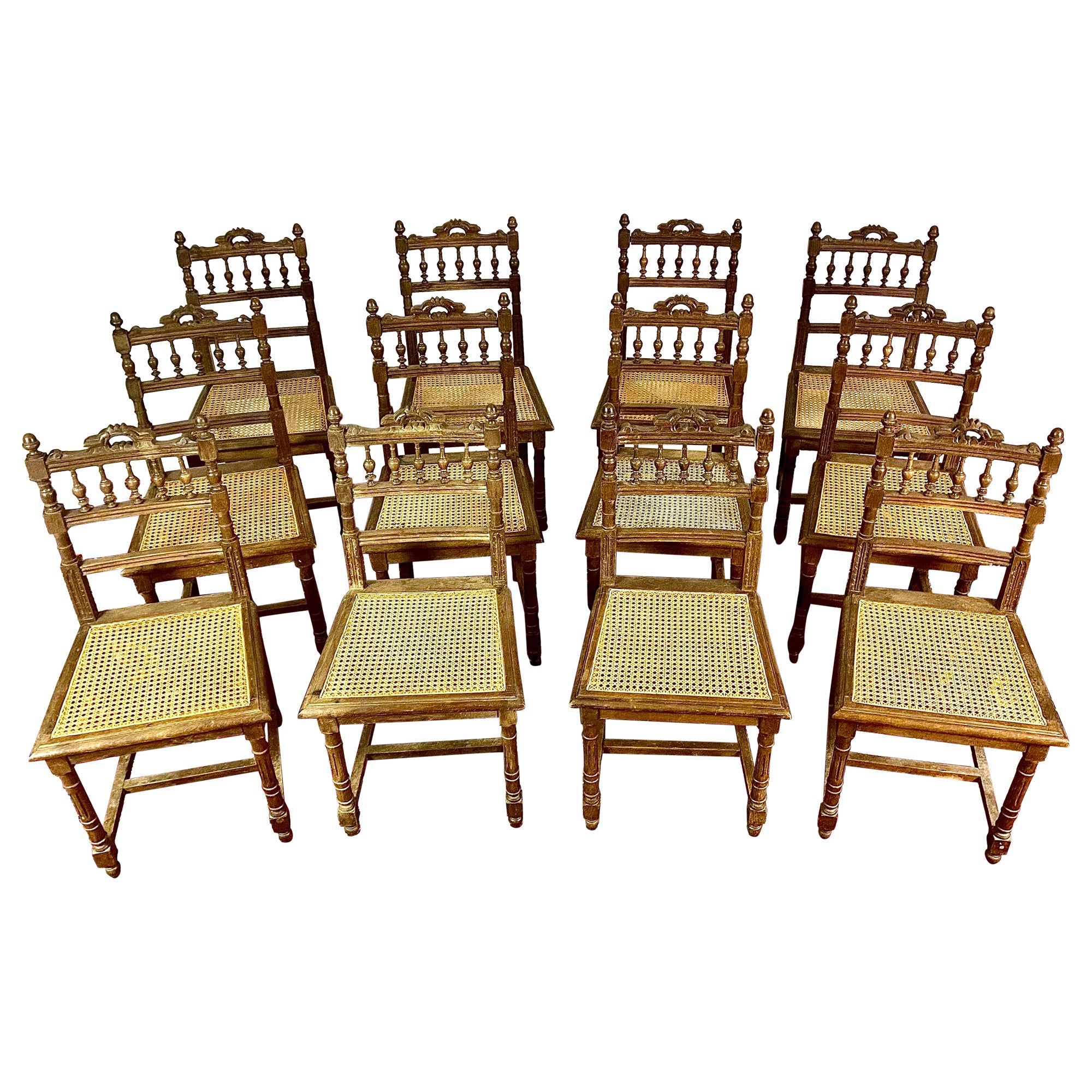 French Set of 12 Henri II cane dining room chairs - Renaissance - 19th - France For Sale