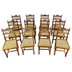 French Set of 12 Henri II cane dining room chairs - Renaissance - 19th - France