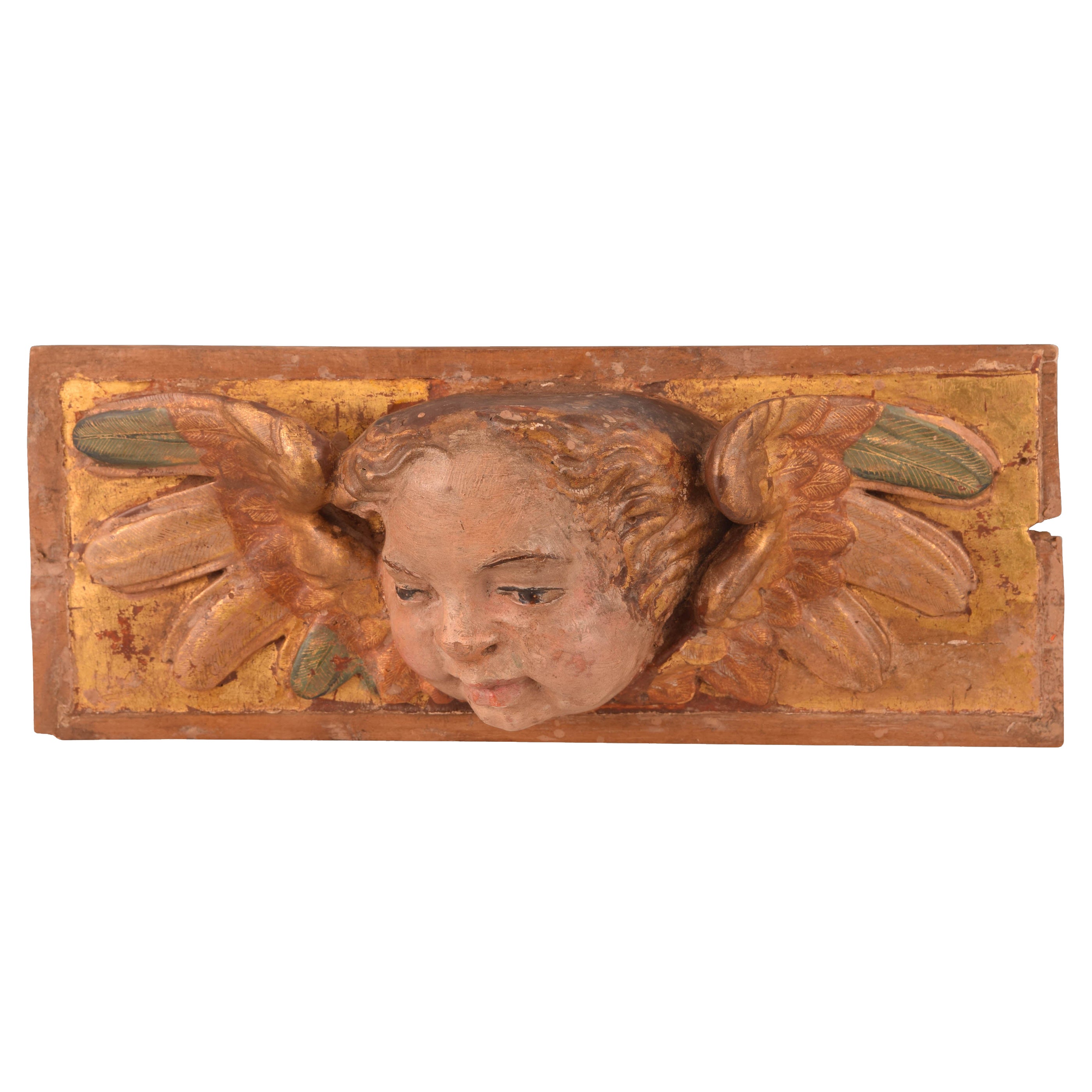 Relief with angel head. Polychrome and gilded wood. Spanish school, 16th century For Sale
