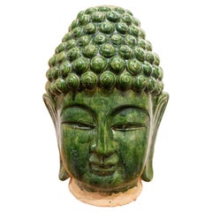 Testa di Buddha in ceramica smaltata verde