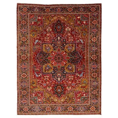 Antiker Heriz handgefertigter persischer Medaillon-Teppich aus roter Wolle