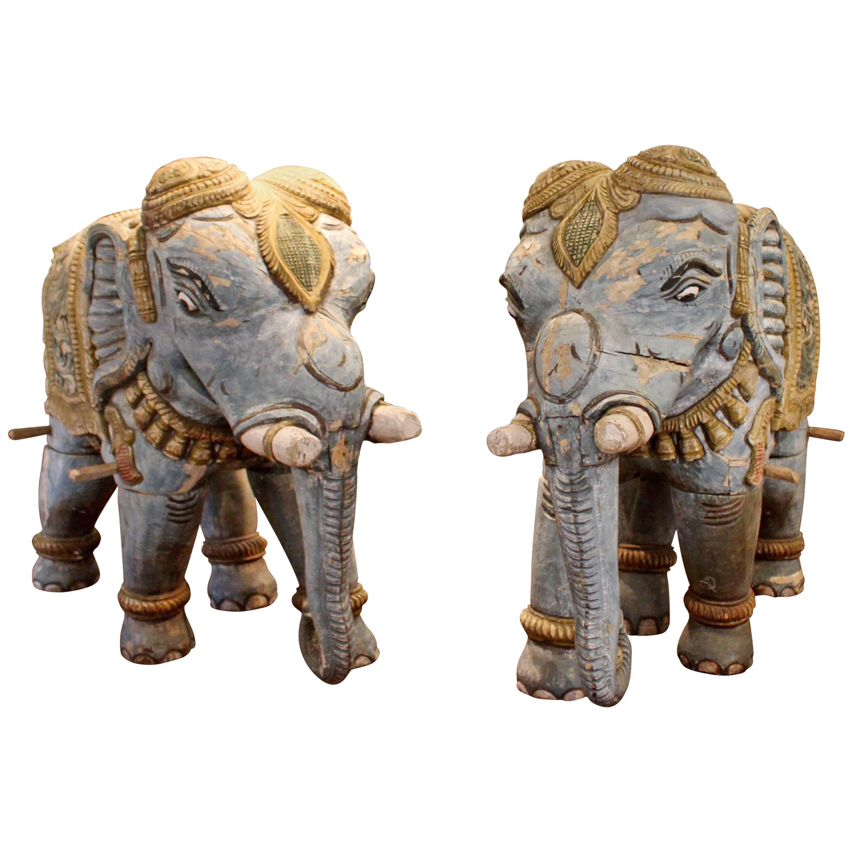 Pair of Parading Polychrome Carved Wood Striding Elephant Sculptures