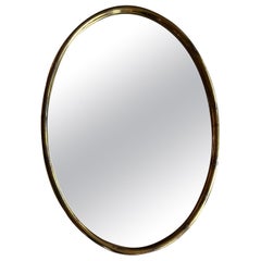 Small oval gilt metal mirror