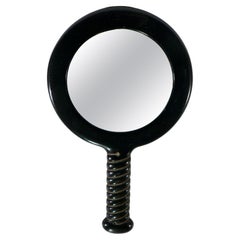 Vintage A black Bakelite handheld mirror double-sided - France - 1950.