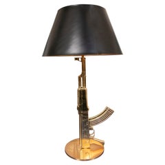 FLOS Guns Collection AK47 Table Lamp in Gold by Philippe Starck