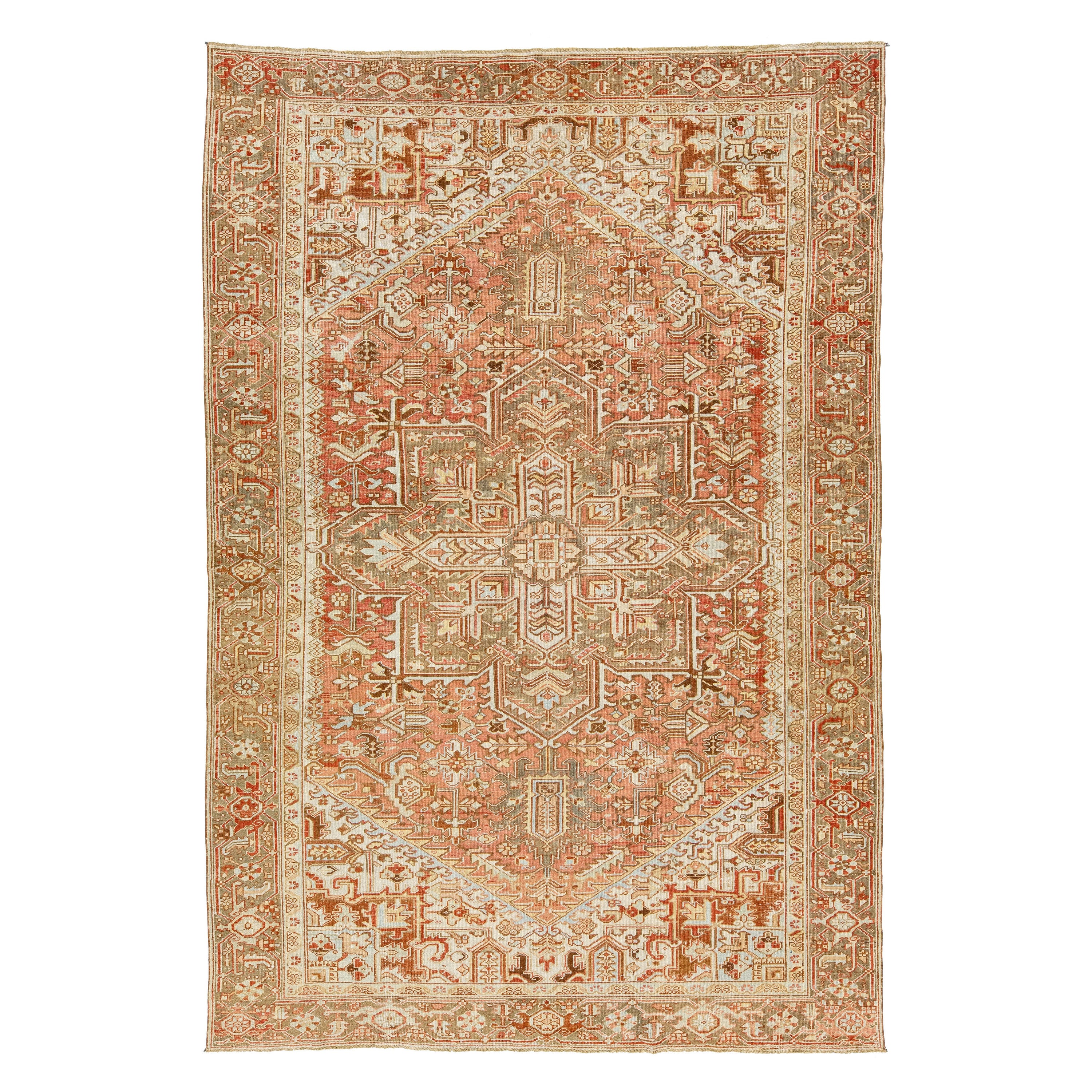 1920s Persian Heriz Antique Wool Rug In Rust Color Featuring a Medallion Motif For Sale