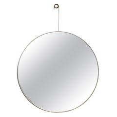 "Eye" mirror in light gold painted steel