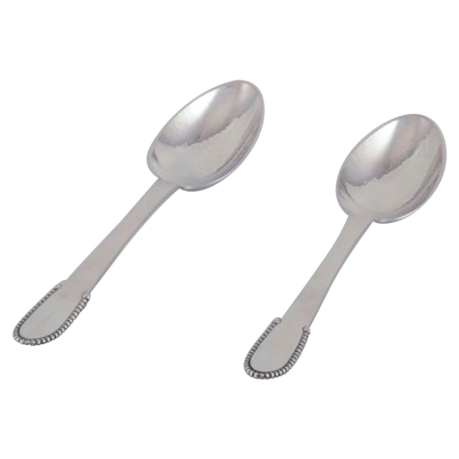 Georg Jensen. Two Beaded tablespoons in 830 silver. Dated 1930.