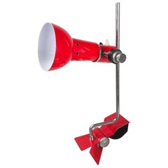 Italian modern  Adjustable table lamp with clamp in red metal, 1980s