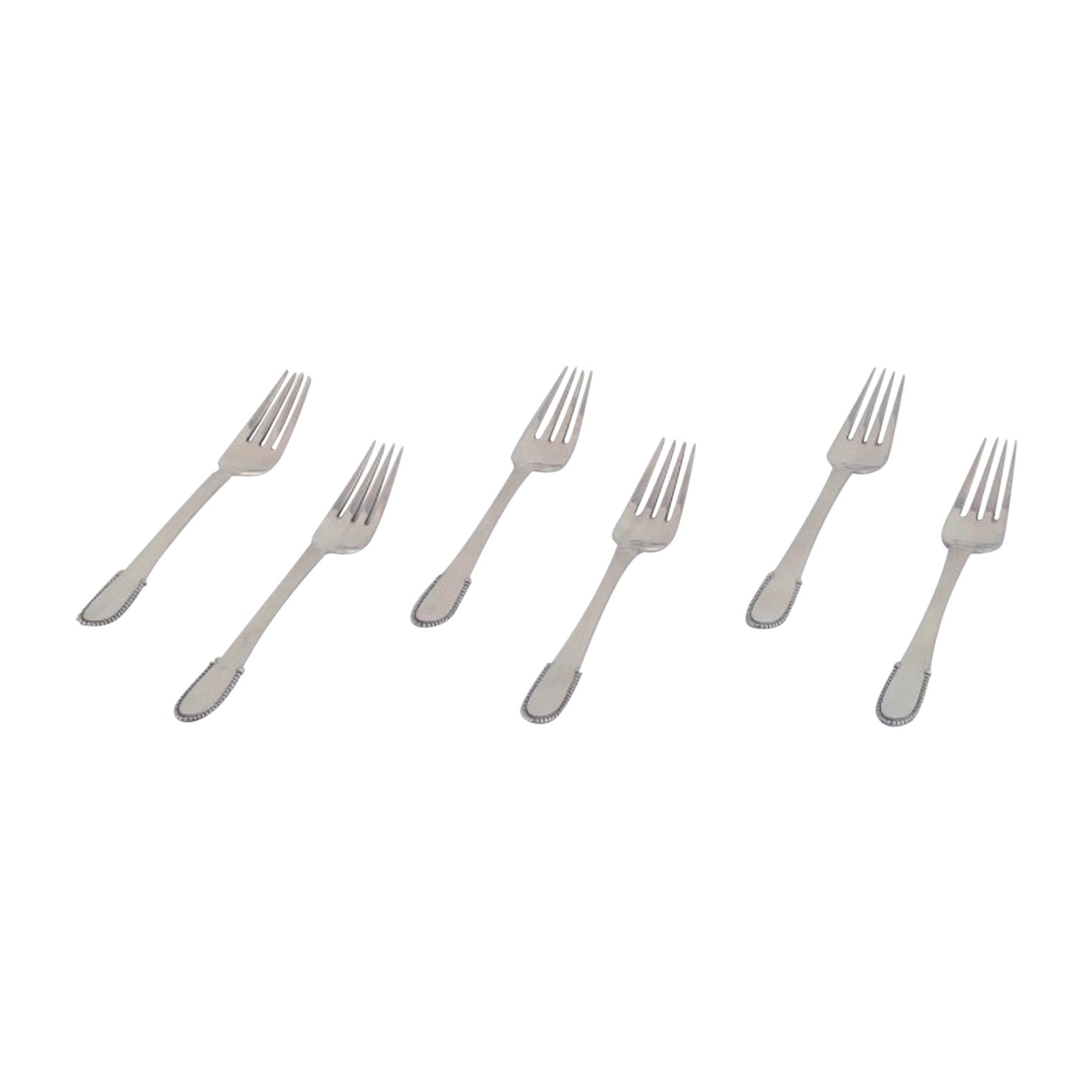 Georg Jensen, set of six Beaded dinner forks in 830 silver. 
