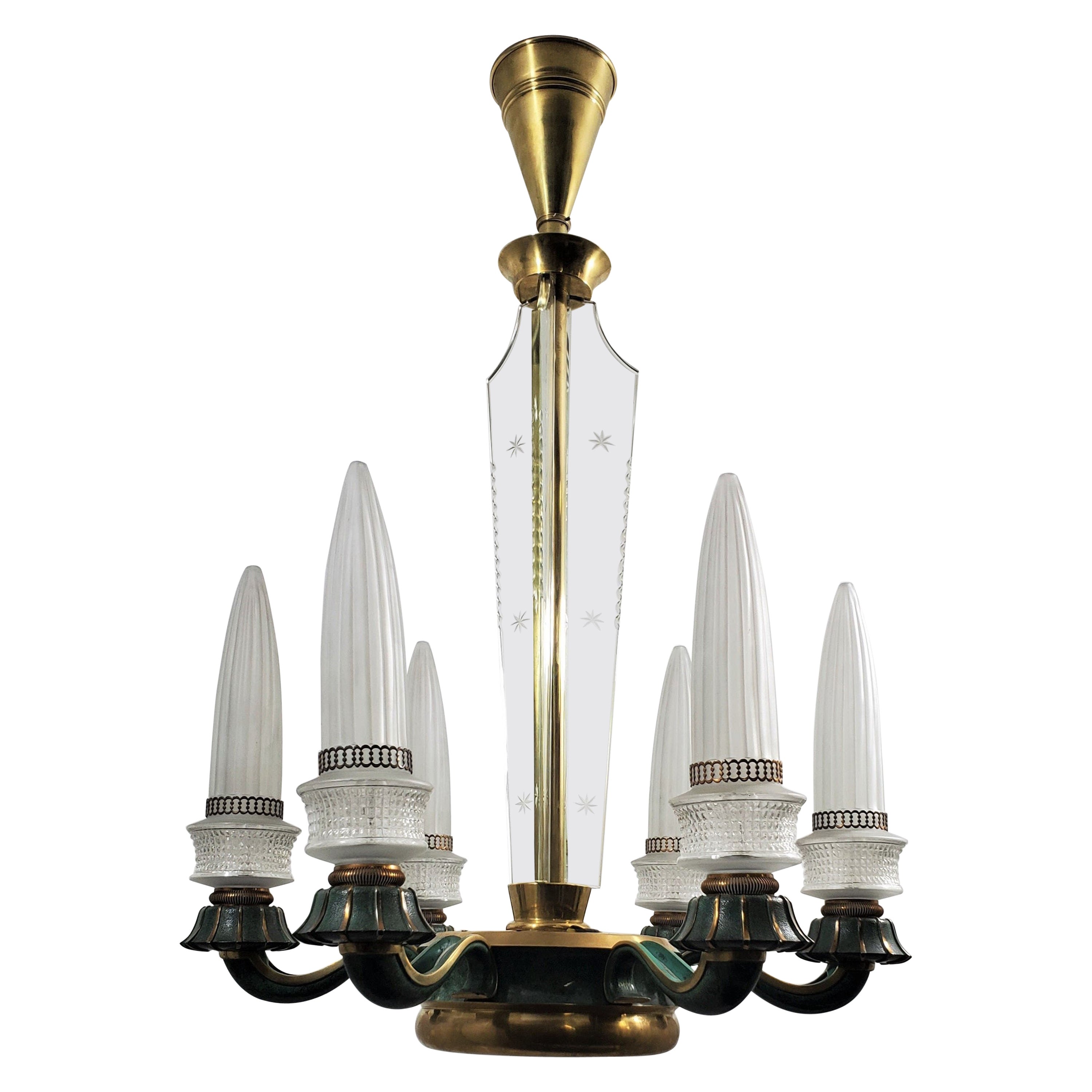 A rare French chandelier boasts six rocket-shaped glass shades on six gently curved arms, adorned with beautifully machined, fluted bobeches. 
The distinctive frosted glass pointed cone shades of this chandelier take on the form of architectural