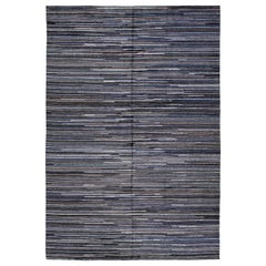 Tapis indien moderne en laine noire et grise à motifs rayés