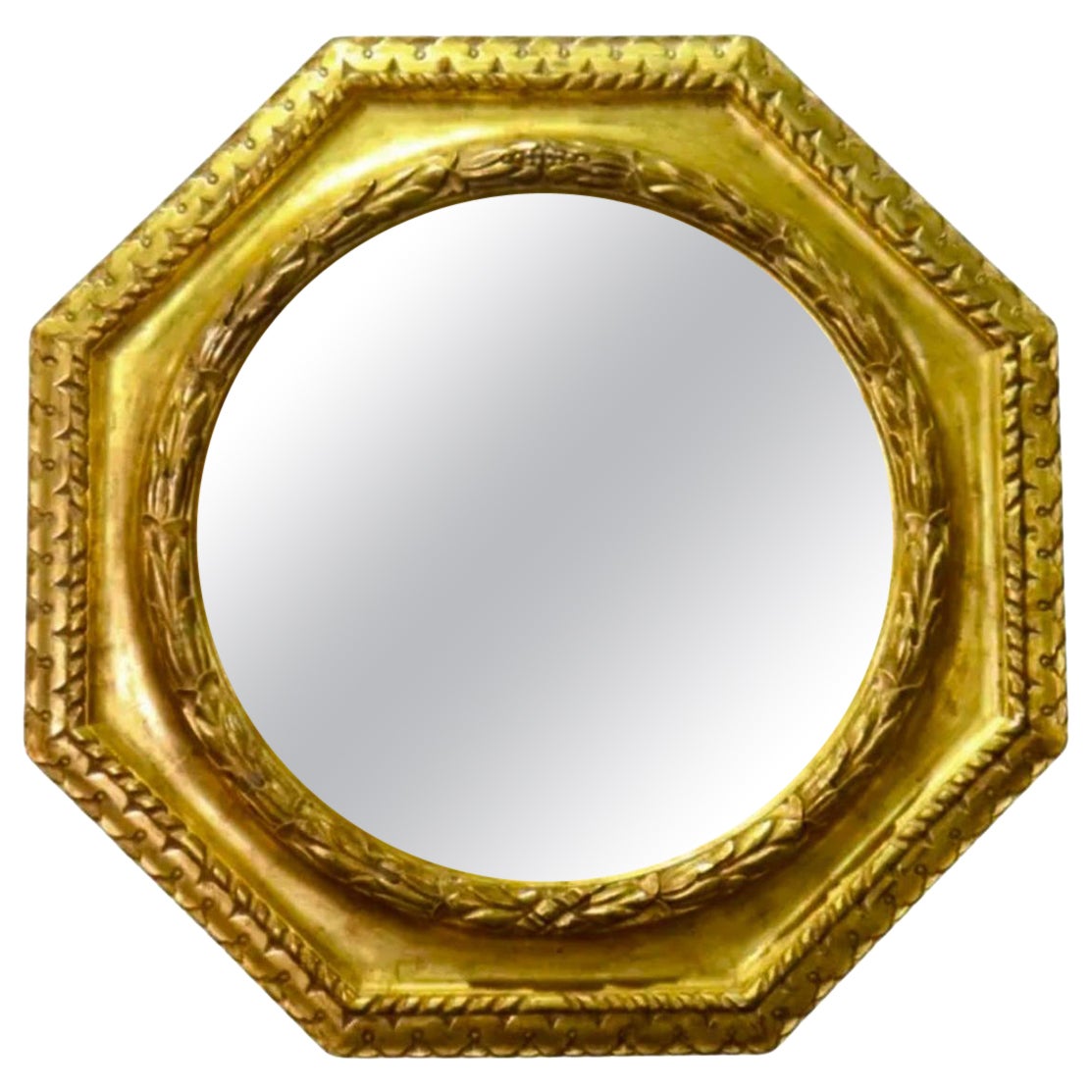 Grand miroir octogonal de style Régence Paul Ferrante en bois doré avec biseau