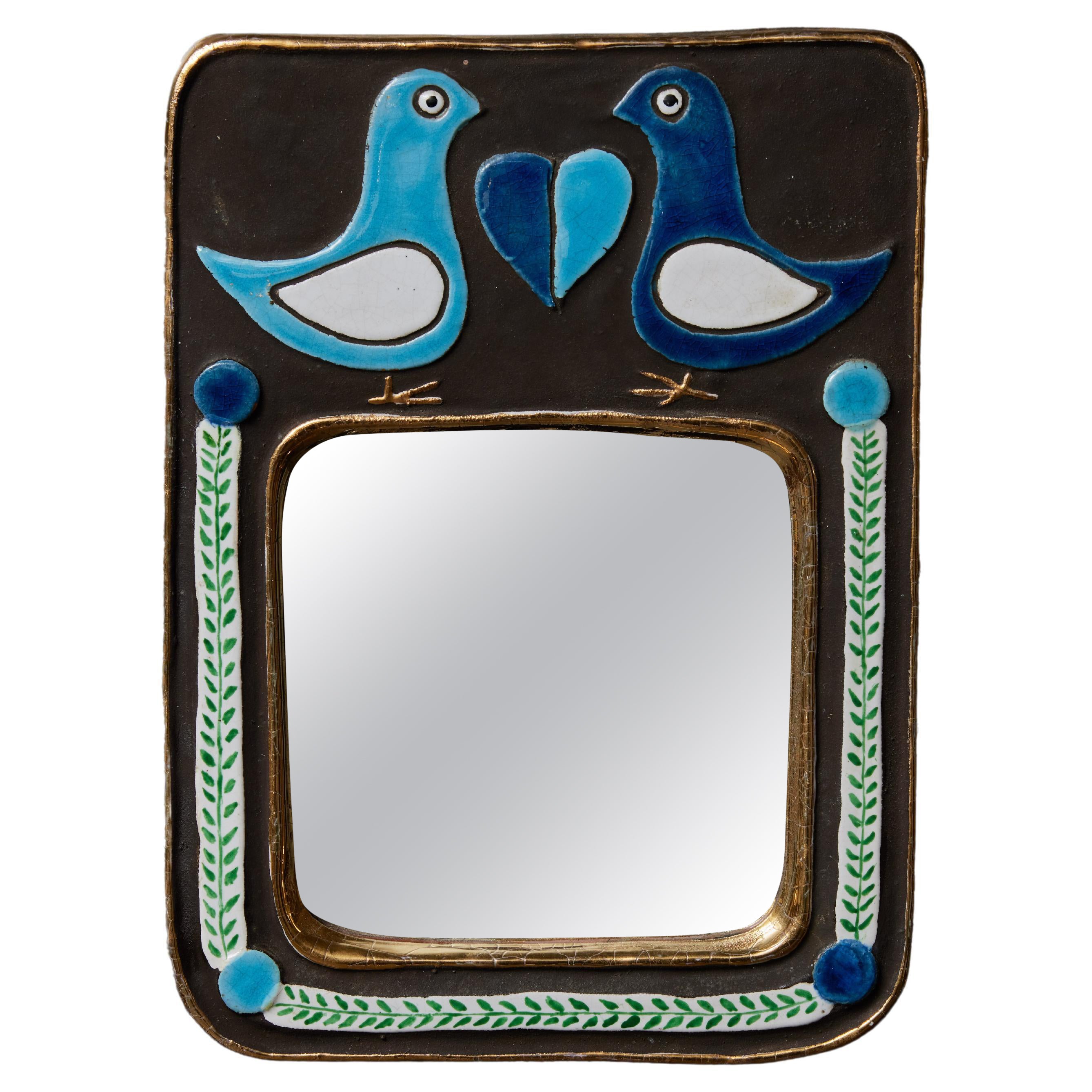 Miroir bleu avec décor d'oiseaux de Mithe Espelt