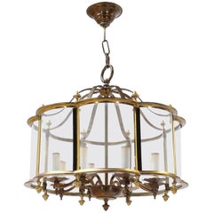 Mid Century Brass Chandelier with Curved Glass Shade