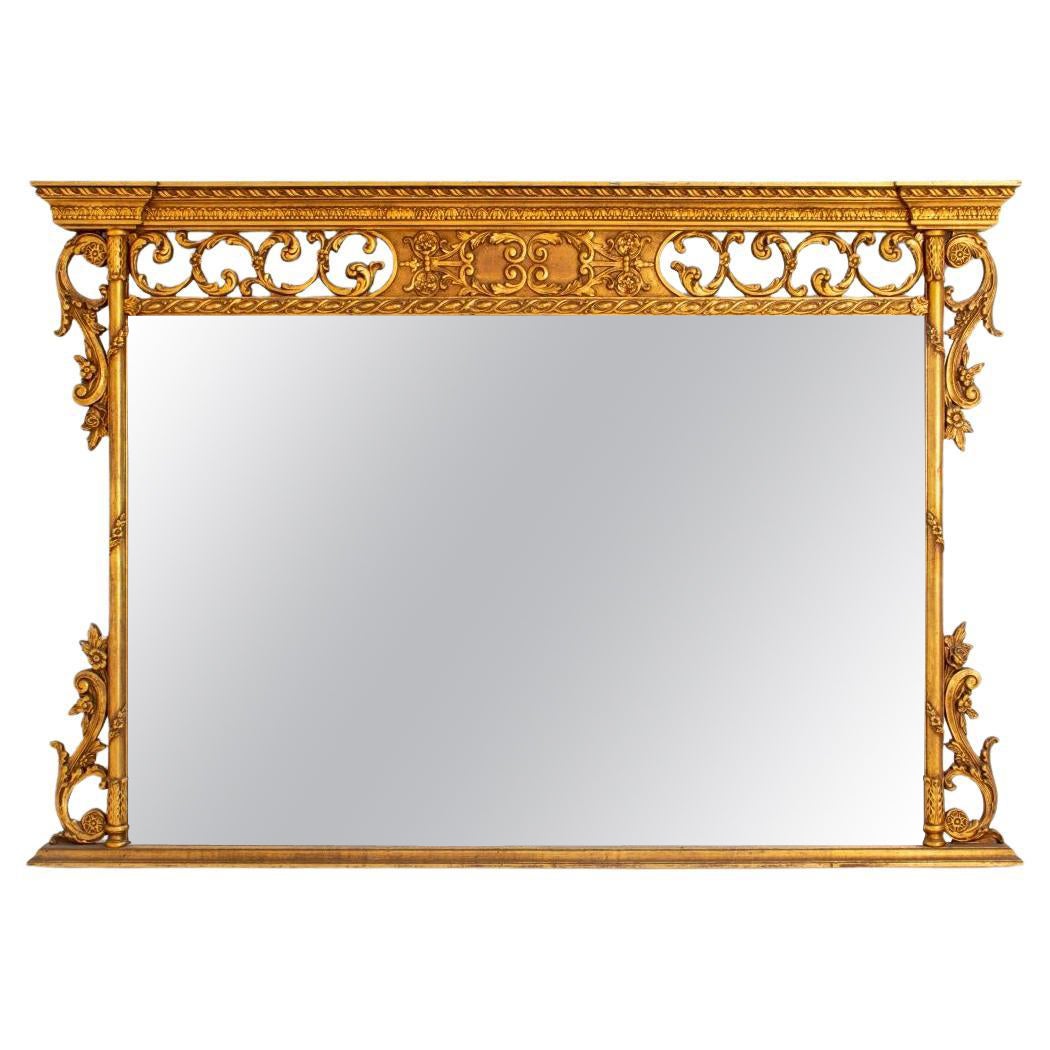 Miroir en bois doré sculpté de style rococo en vente