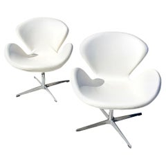 Vintage Organic Modern Designed Swivel Lounge Chairs In White With Cast Aluminum Base