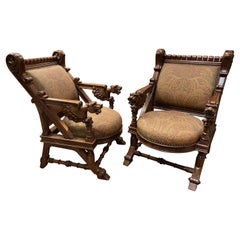 Antique Pair of 19th Century Carved Upholstered Chairs with Griffin Arms