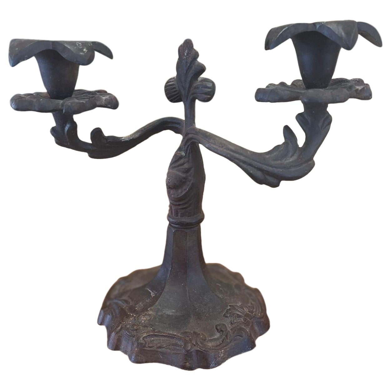 Vintage Candelabra With Ornate Detailing and Floral Design.