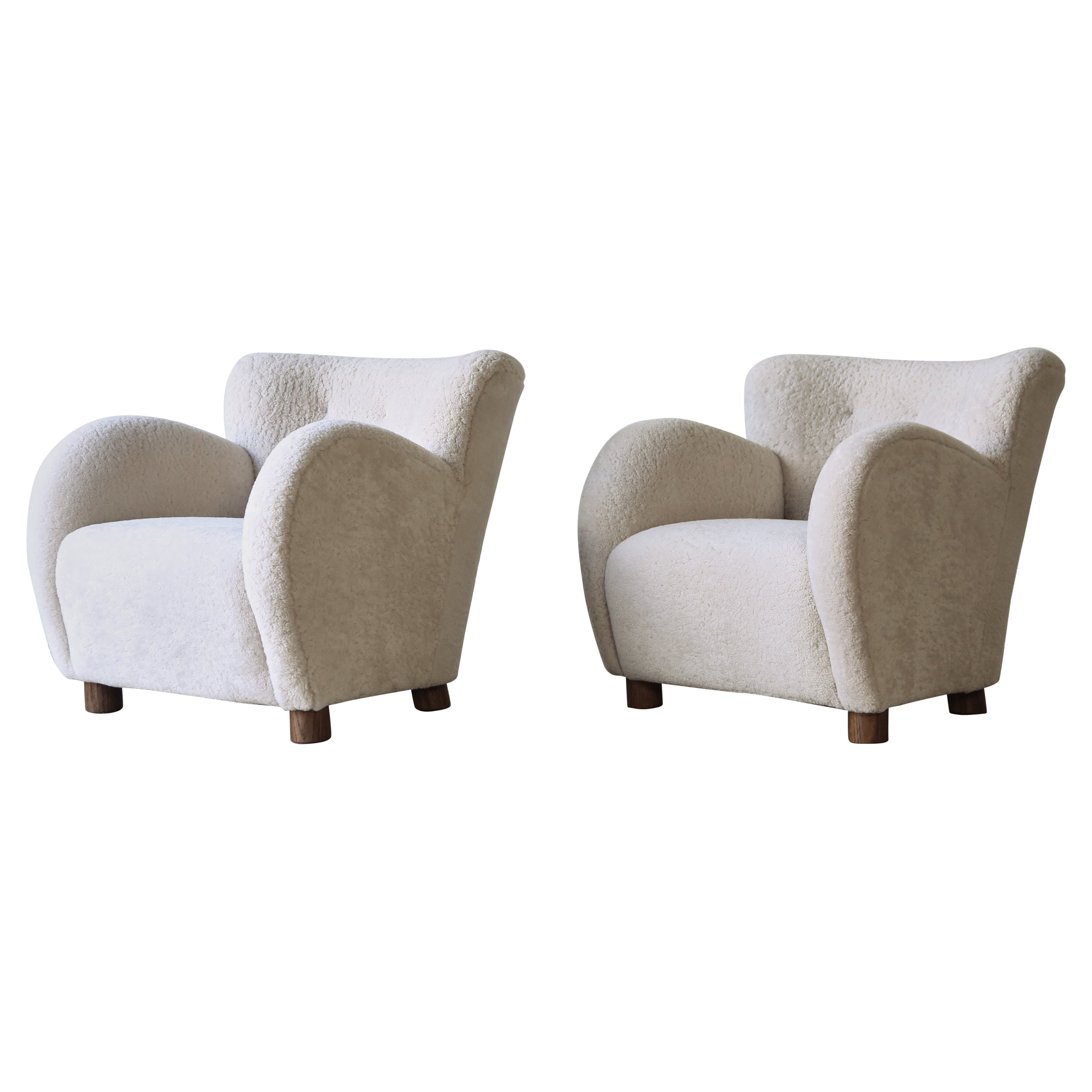 Superb Pair of Lounge Chairs, Upholstered in Natural Sheepskin For Sale