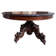Ancienne table de chasse française ROUND Dining Hunt Game Table en chêne sculpté Black Forest Pedestal