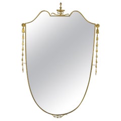 Used Mid-century Italian mirror in brass. Italy 1950s