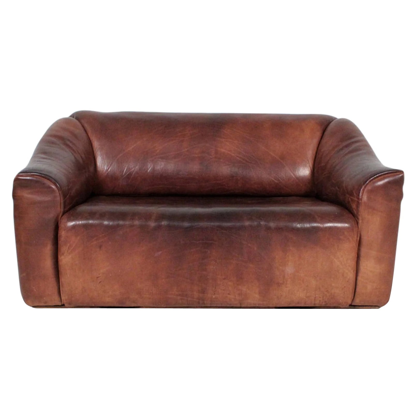 Beautifully patinated ds47 loveseat in buffalo leather by desede For