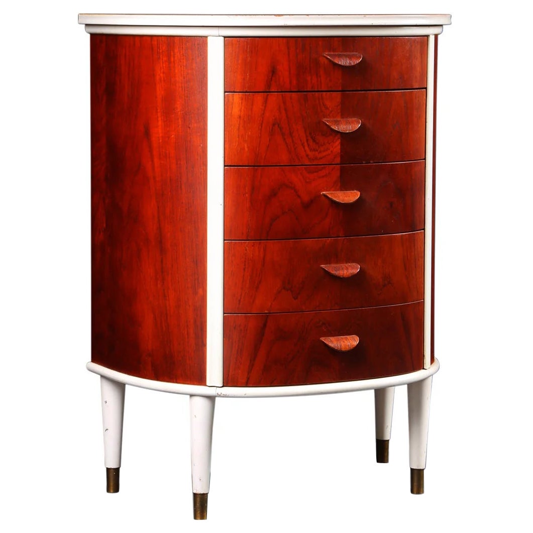 Danish modern five drawer bow front chest in teak + white lacquer