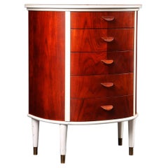 Danish modern five drawer bow front chest in teak + white lacquer