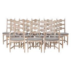 Set of Twelve Soaped Oak Highback Dining Chairs by Henning Kjaernulf