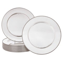 Set von 24 Silber- untertellern 