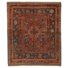 Resplendent Oushak: A Tapestry of Turkish Heritage and Vibrant Hues