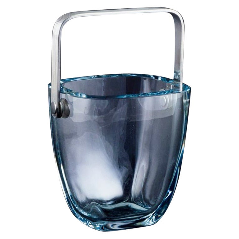 Danish design. Modernist ice bucket in art glass with a silver handle.  For Sale