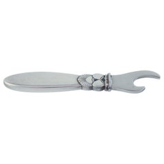 Georg Jensen Cactus. Bottle opener in sterling silver and stainless steel.