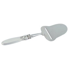 Cactus de Georg Jensen Coupe-fromage en argent sterling et acier inoxydable 