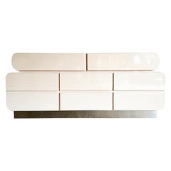 Postmodern Galactic Light Pink Lacquer Laminate Waterfall Dresser