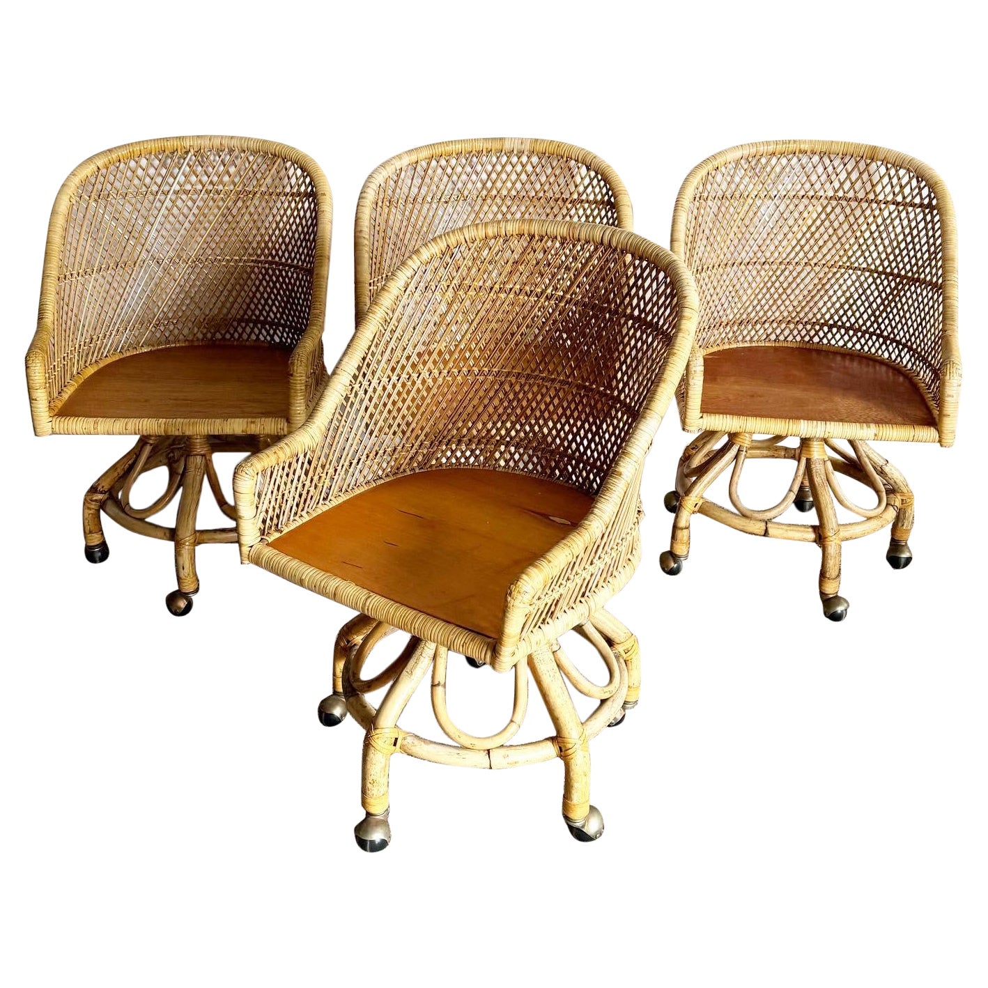 Boho Chic Buri Rattan Bamboo Swivel Barrel Dining Chairs on Casters - Set of 4 For Sale