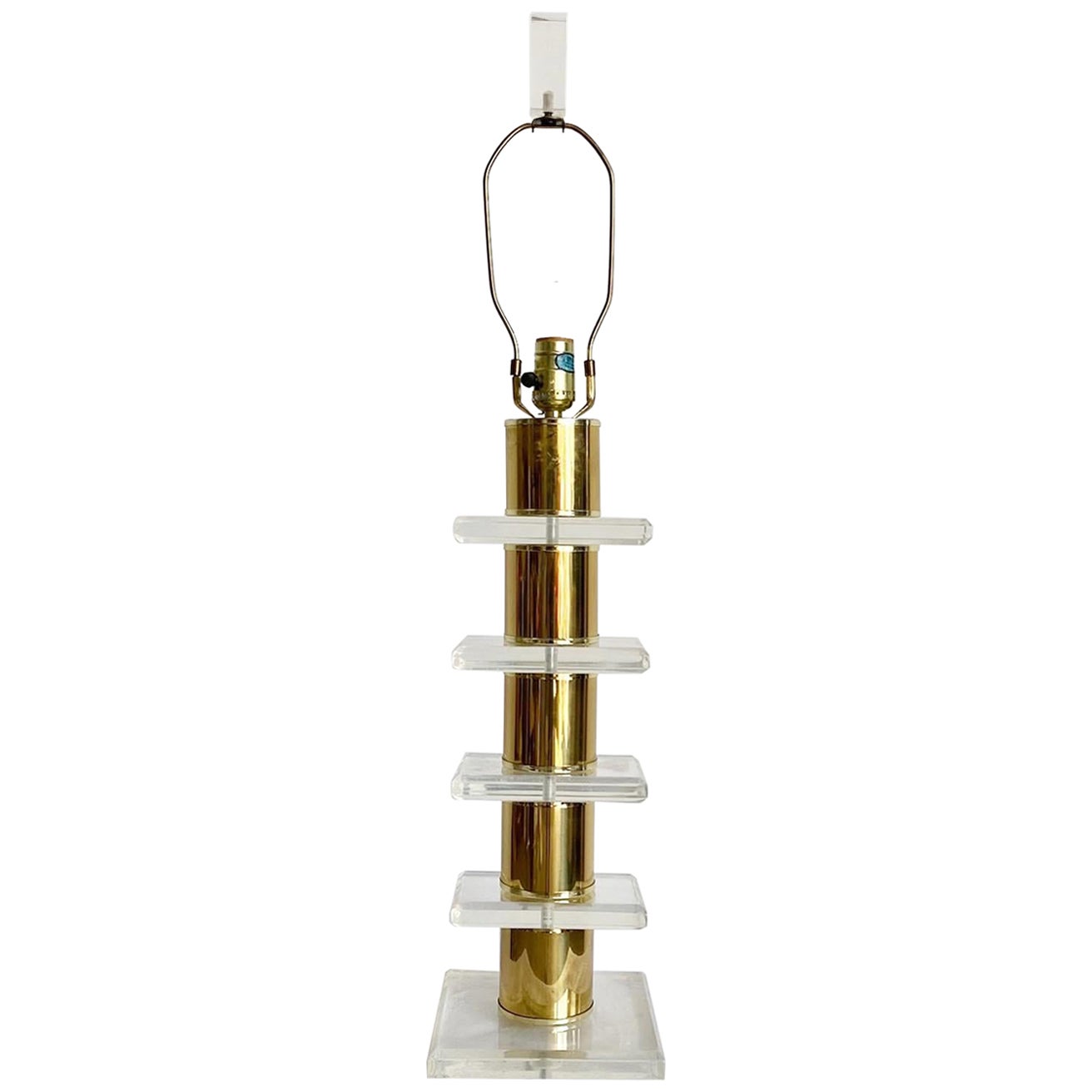 Mid Century Modern Stacked Lucite and Gold Table Lamp For Sale