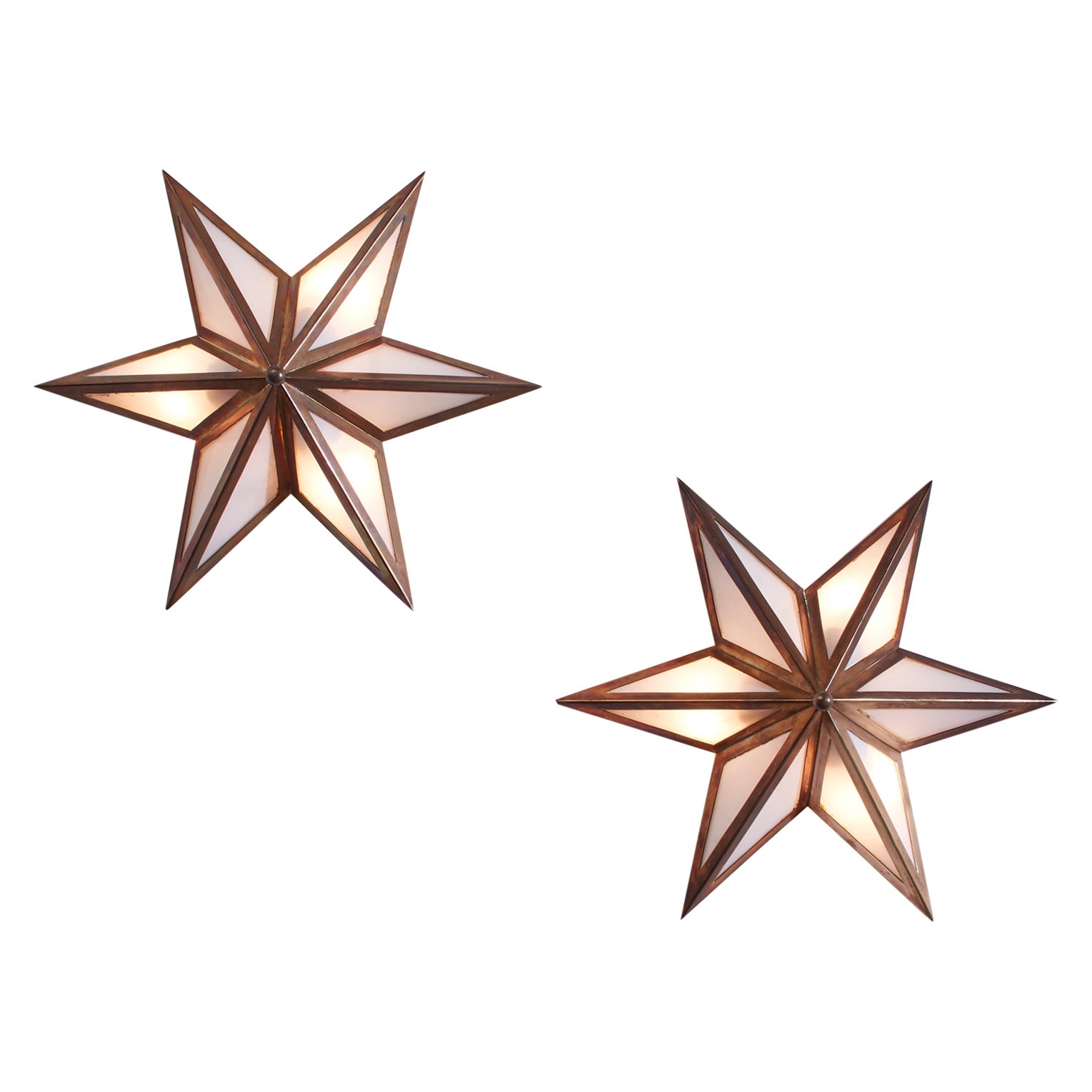 A pair of star-shaped wall sconces made of brass and glass, Italy, 1960s For Sale