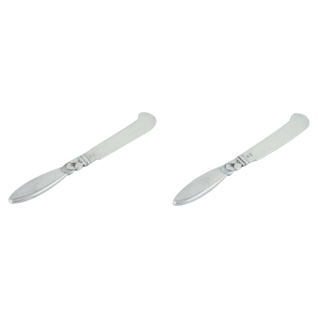 Georg Jensen Cactus. Two all-silver butter knives. 