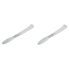 Georg Jensen Cactus. Two all-silver butter knives.