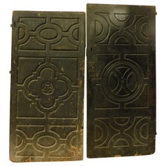 Pair of old interior doors, black lacquered and carved, Italy